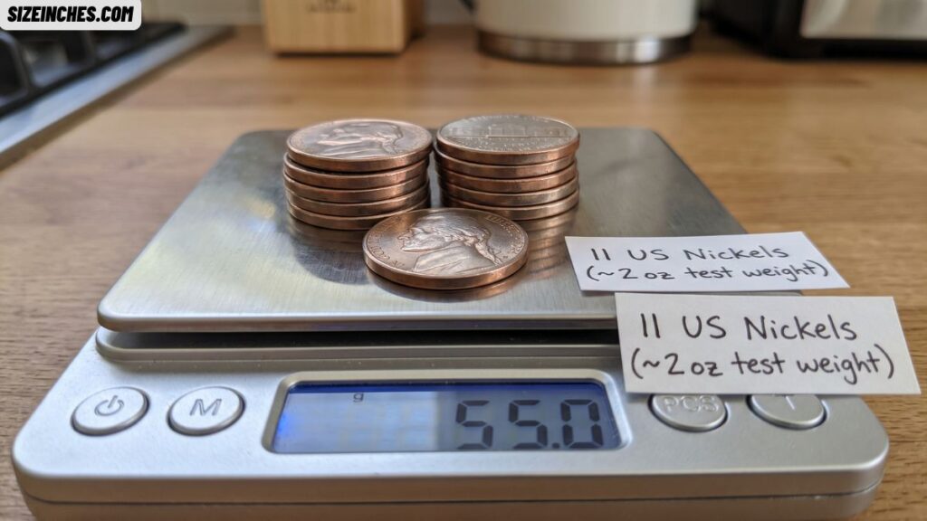 Eleven US nickels weighing about 2 ounces or 55 grams