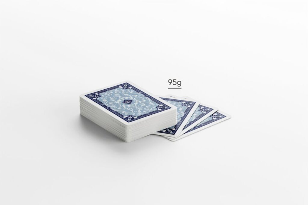 A deck of playing cards weighing about 90 to 95 grams as a 100 gram guide